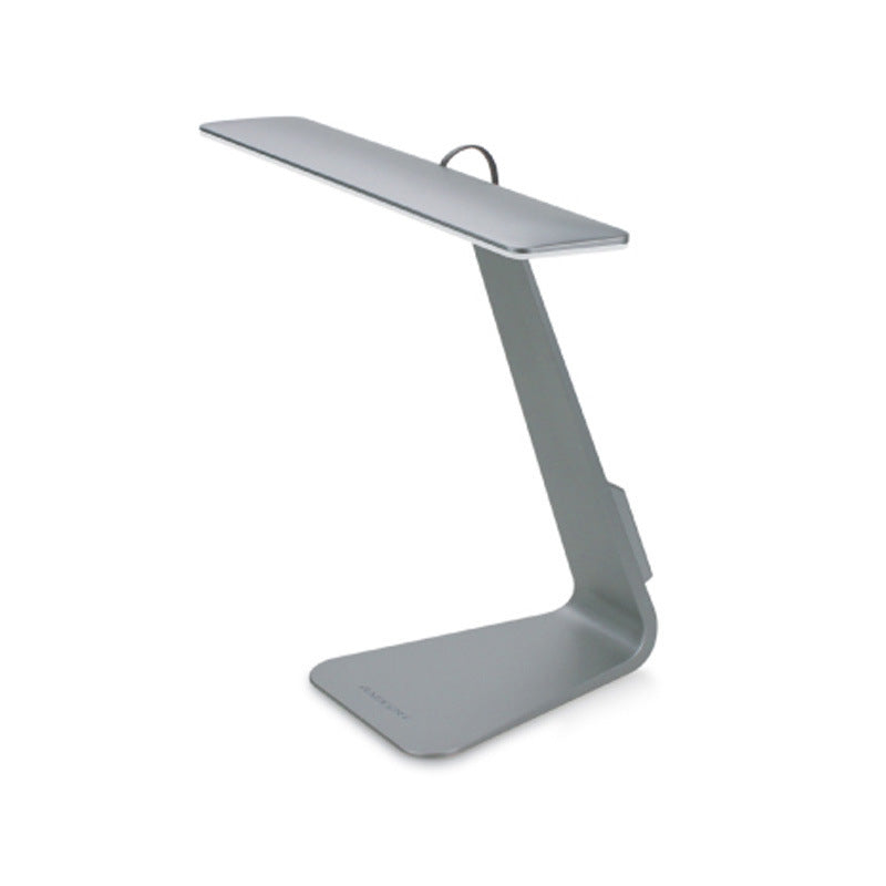 Folding ultra-thin LED charging desk lamp