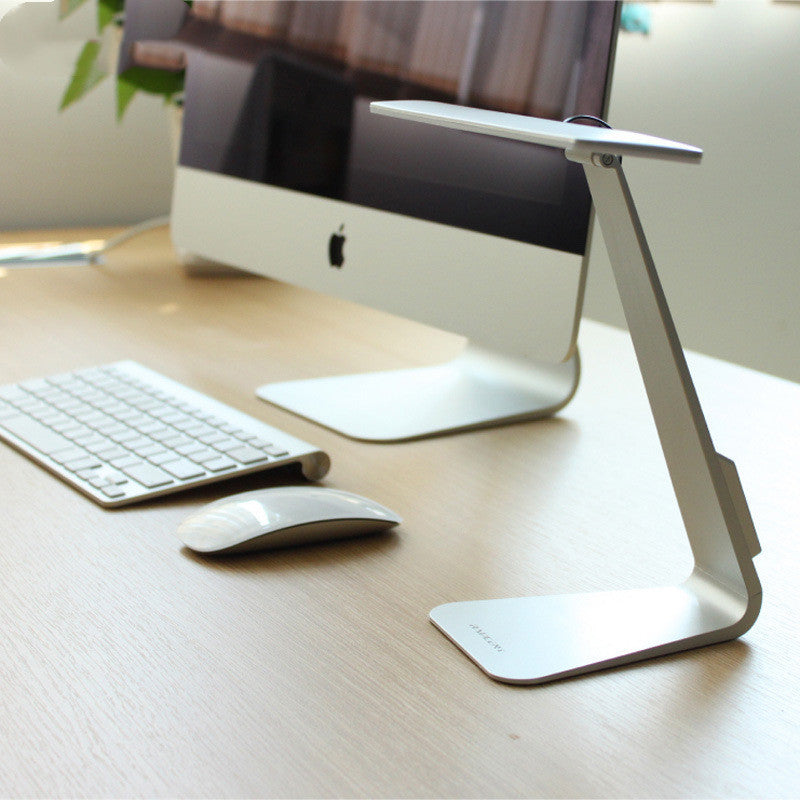 Folding ultra-thin LED charging desk lamp