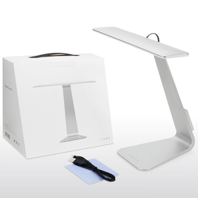 Folding ultra-thin LED charging desk lamp